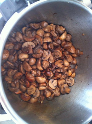 Water cooked off and mushrooms roasting